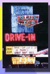 blue top drive in sign at night